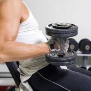 man lifting weights at a gym